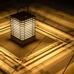 Tekura Outdoor Solar LED Lantern -City Lights Store les jardins tekura outdoor solar led lantern lifestyle 031925 05 276bc801 08dc 4b0d 8f7a 5ebd654f29d6